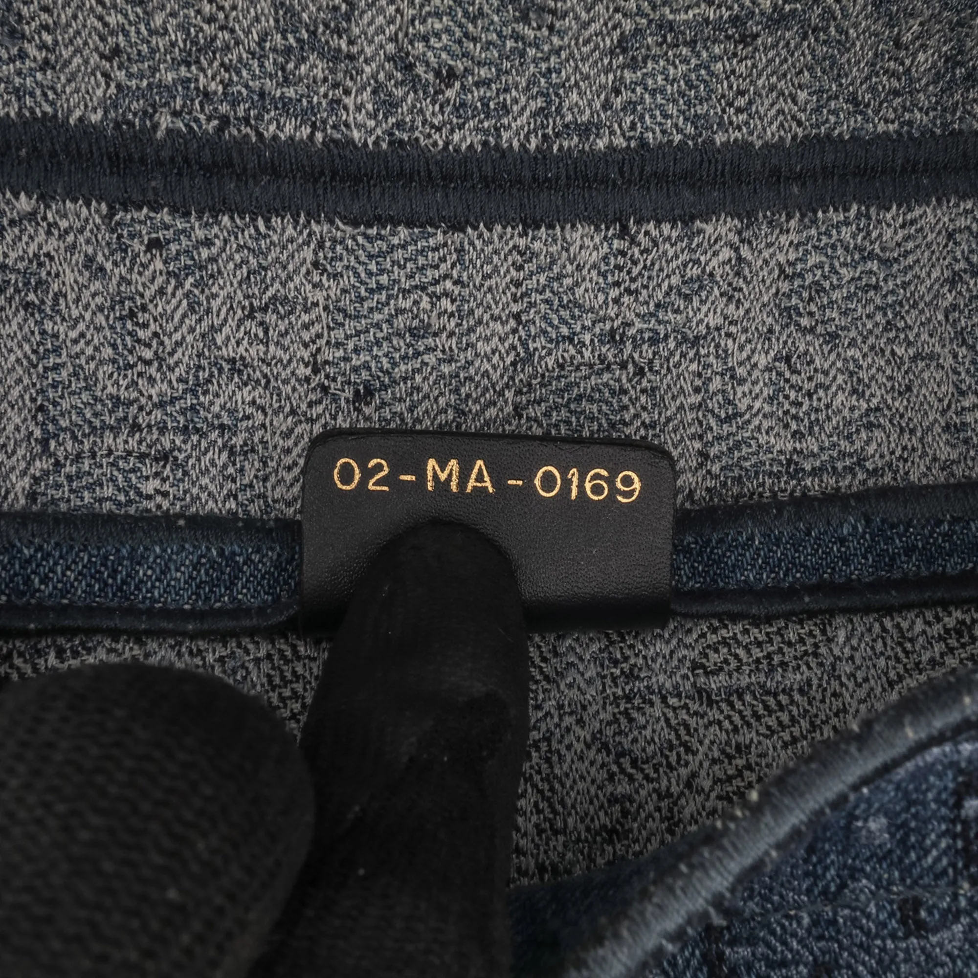 Oblique Embroidered Denim Saddle Bag