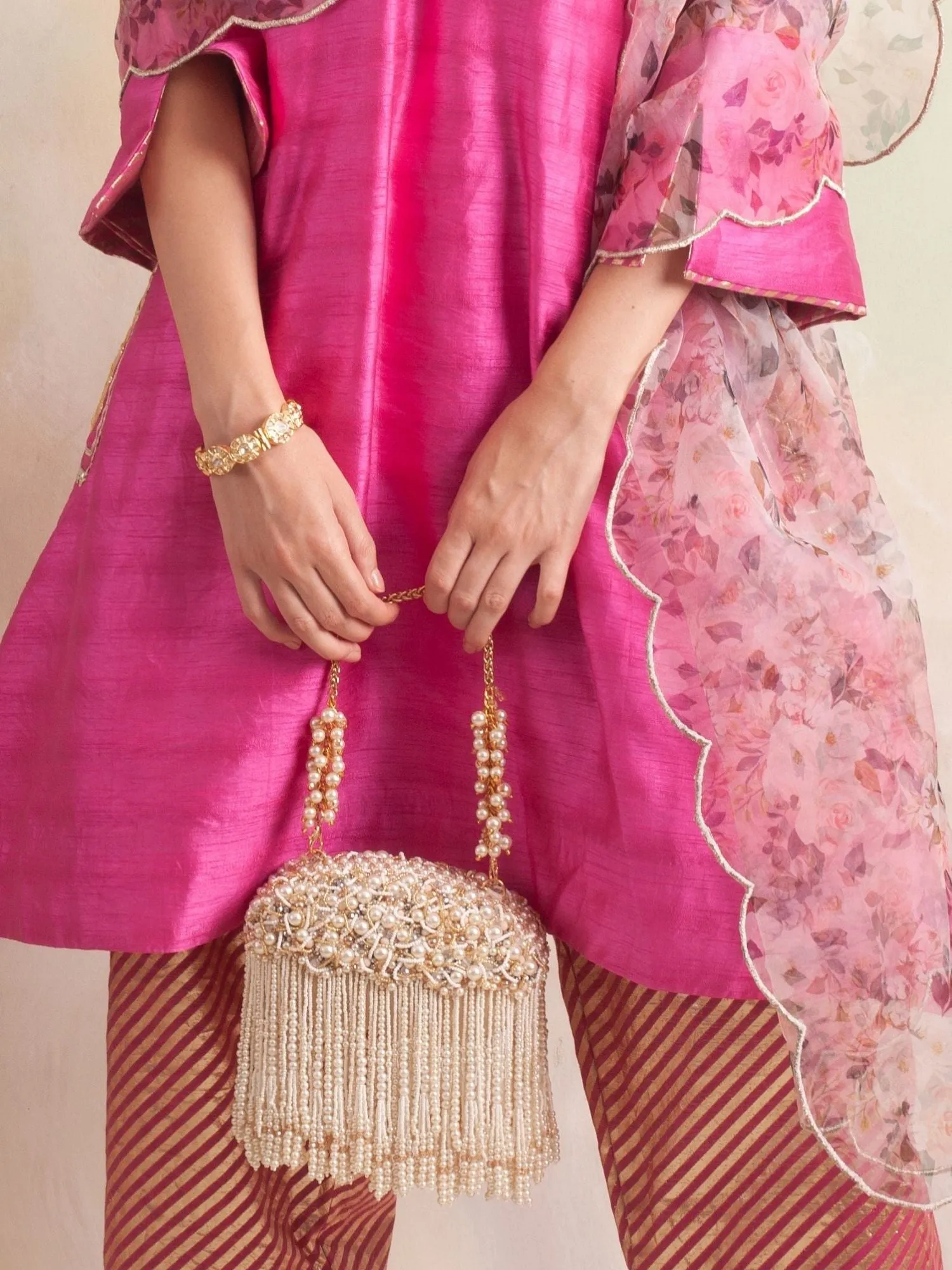 Zuri Oval Clutch - With Tassels